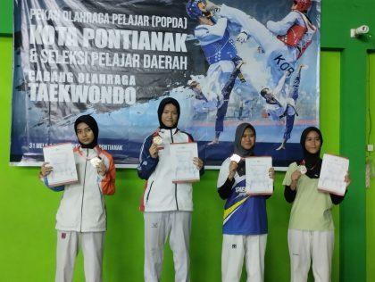 Read more about the article Siswi Tetra Raih Medali Emas Cabor Taekwondo